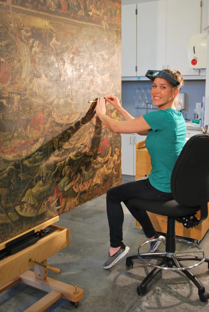 Conservator in the Laboratory at The Ringling working on Watermelon Regatta in 2016.